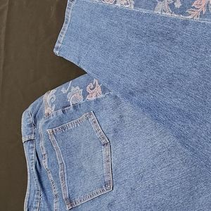 WOMAN WITHIN BRAND size 22 floral painted jeans. NEVER WORN.